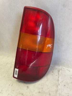 Vw caddy ii лампа ліва лівий задній w06k9945095 фото №1