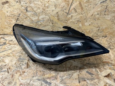 Opel astra v k лампа ліва перед передня 39077801 фото №1