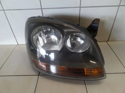 Nissan almera tino 2000 лампа фара правый перед передний фото №1