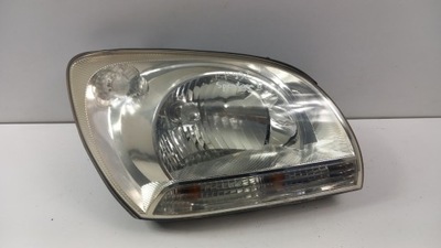 Kia sportage ii лампа перед правая фото №1