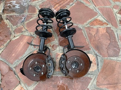 Nissan serena поворотний кулак амортизатор правий фото №1