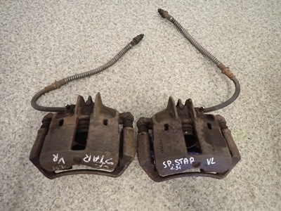 Space star 1.3 98-05 суппорт передний левый lub правый фото №1