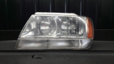 Фара лівий перед jeep grand cherokee фото №1