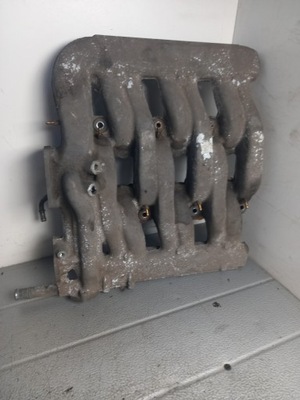 Колектор всмоктуючий ford mondeo mk2 96-00r фото №1