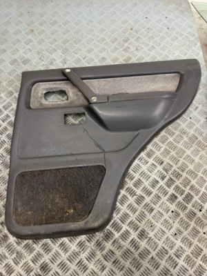 Обшивка оббивка двері правий задня mitsubishi pajero ii 5d фото №1