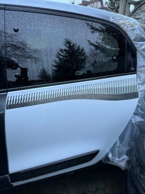 Renault twingo iii двері ліва задня колір dvqnj білий фото №1