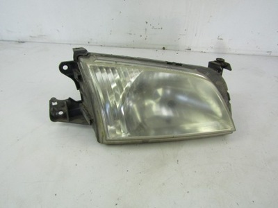 Mazda demio dw фара правий 5d фото №1