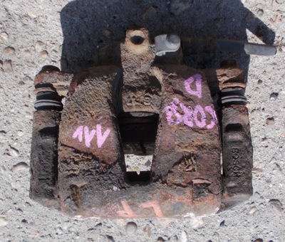 Opel corsa d 1.4 11r супорт гальмівний лівий перед фото №1