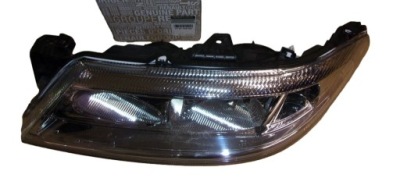 Фара левый новый оригинал 7701048927 renault фото №1