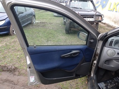 Обшивка оббивка лівий перед fiat punto 2 ii фото №1