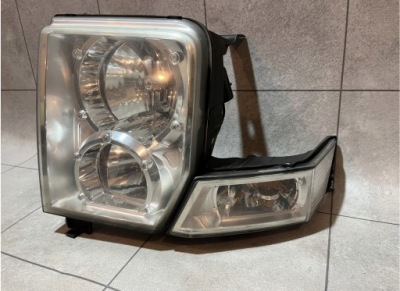 Jeep commander xk xh лампа ліва фара лівий перед оригінал uk bdb фото №1