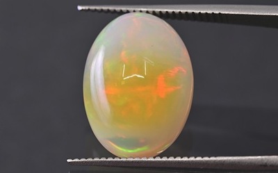 Opal z Etiopii kaboszon owal 14,5x10,5 mm