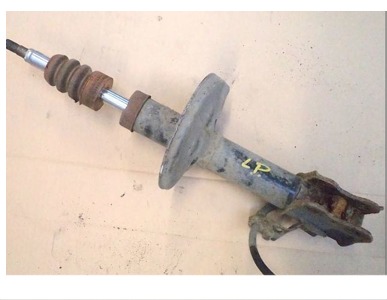 Toyota carina e 95r hb - амортизатор лівий перед фото №1