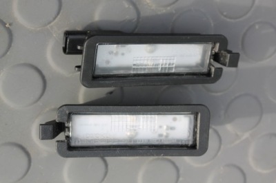 Лампа номерного знака освітлення 68276972aa chrysler pacifica 16- фото №1