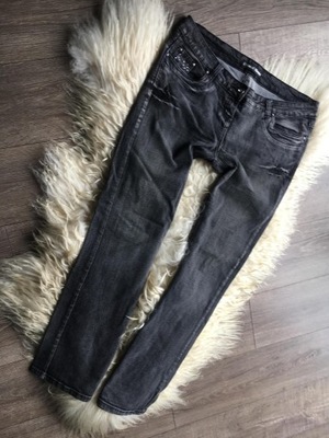 denim spodnie jeansy rozciągliwe lekki klosz 44