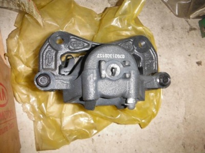 Суппорт тормозной передний левый kia rio 2005-2011 фото №1