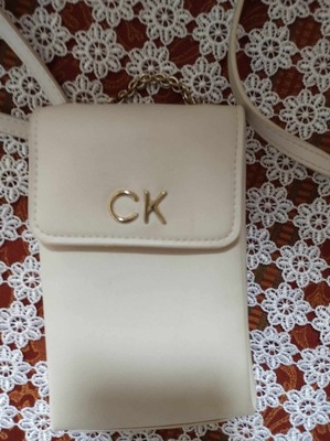 CK,oryginalna torebka na telefon,karty,bezowa.