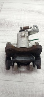 Renault scenic 2 ii супорт гальмівний правий задня + скоба + гальмівні колодки фото №1