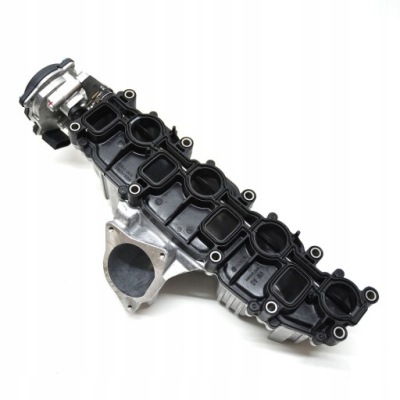 Оригінальний колектор всмоктуючий 03l129711e 2.0tdi audi фото №1