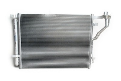 Радіатор кондиціонера kia 976062t000 фото №1
