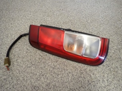 Suzuki ignis 00-03 лампа задня ліва фото №1