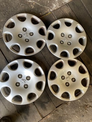 9637540880 TAPACUBOS PEUGEOT 15” JUEGO  