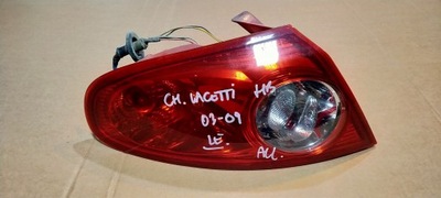 Chevrolet lacetti hb 03-09 лампа левый задняя фото №1