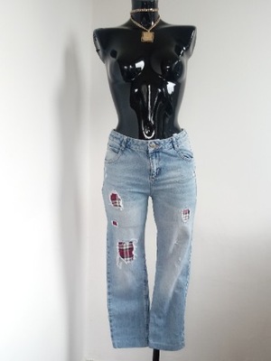 Modne jeansy z dziurami kratka spodnie jeansowe XS