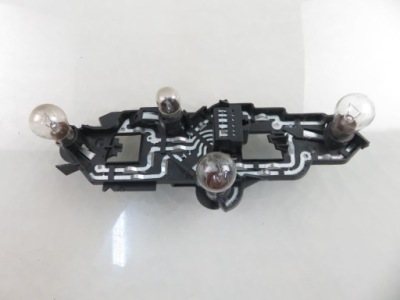 Вкладиш лампи лівий задня peugeot 307 фото №1