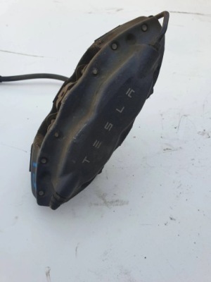 Tesla s суппорт тормозной левый задняя фото №1