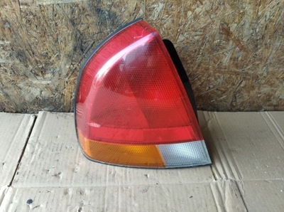 Лампа задняя левая mitsubishi carisma фото №1