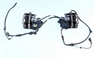 Audi a4 b9 суппорт тормоза левый задняя фото №1