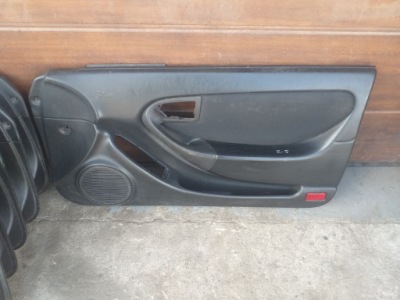 Toyota celica vi обшивка оббивка двері правий фото №1