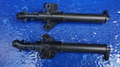 Volvo v40 - лівий омивач лампи фара фото №1