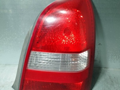 Лампа задня права nissan primera p12 89025237 sedan фото №1