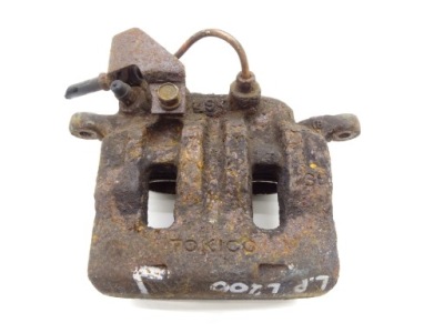 Суппорт тормозной левый перед mitsubishi l200 2.5 td фото №1