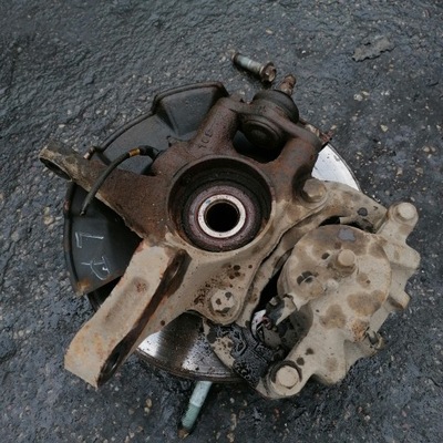 Kia sportage ii 2.0b поворотный кулак левый перед фото №1