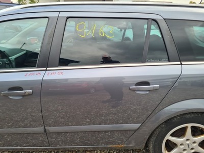 Дверь левая задние opel astra h kombi z155 фото №1