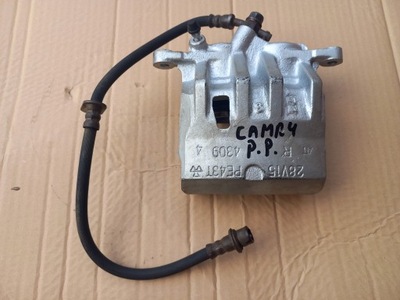 Lexus es toyota camry 92-96 суппорт перед двухпоршневой po rewizji фото №1