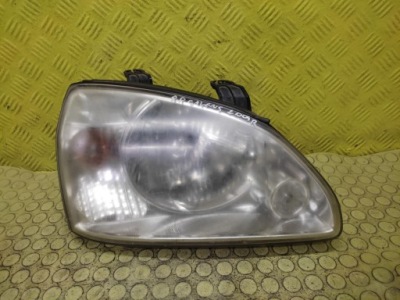 Kia carens 2 фара фара правий перед фото №1