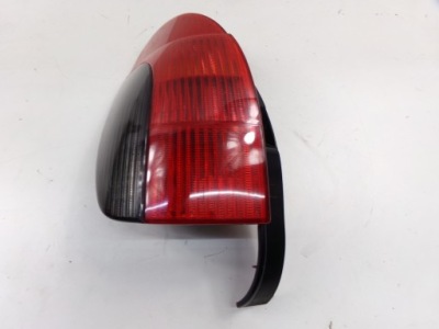 Peugeot 306 97-02 лампа задня ліва kombi + вкладиш фото №1