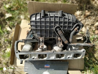 Колектор kia carens фото №1