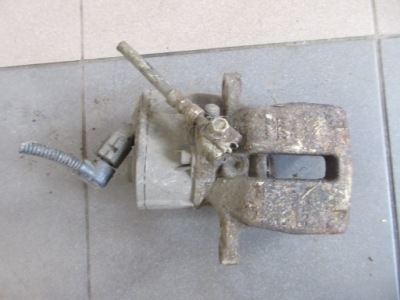 Суппорт тормозной левый задняя vw passat b7 kombi фото №1