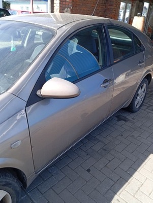 Nissan primera p12 hb двері ліва передні перед голий фото №1