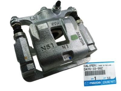 Mazda 2 dj dl 15 - 19 супорт гальмівний лівий перед оригінал фото №1