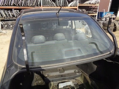 Nissan tiida скло задня задня sedan фото №1