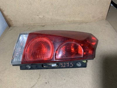 Лампа левая задняя nissan quest 265555z000 фото №1