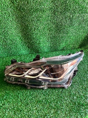 Фара левый toyota corolla e21 sedan фото №1