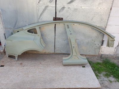 Tesla 3 обшивка праве крила правий фото №1