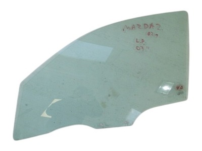 Скло двері лівий перед mazda 2 2003 фото №1